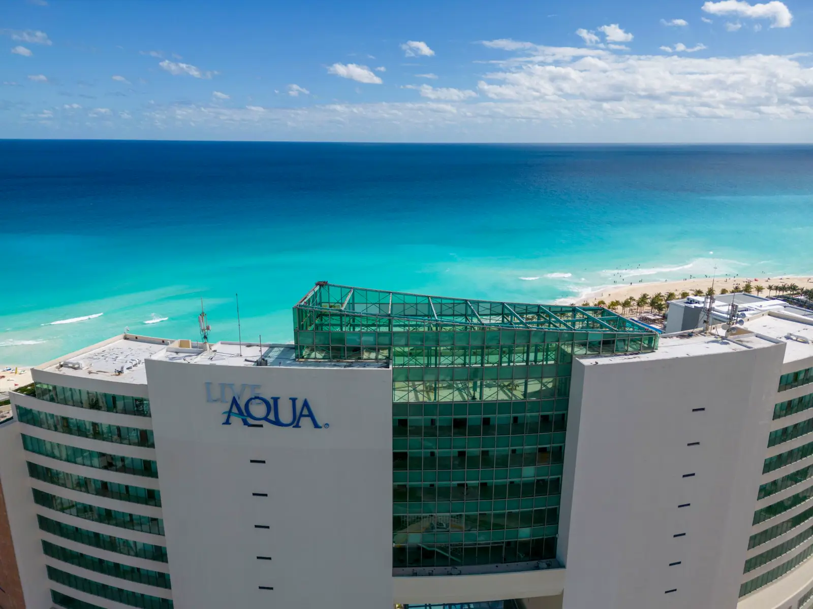 A beachfront resort and turquoise sea in Cancun's Hotel Zone