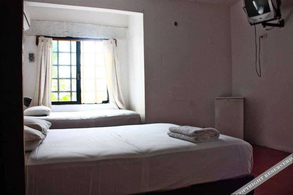 Haina Hostal: Room photos