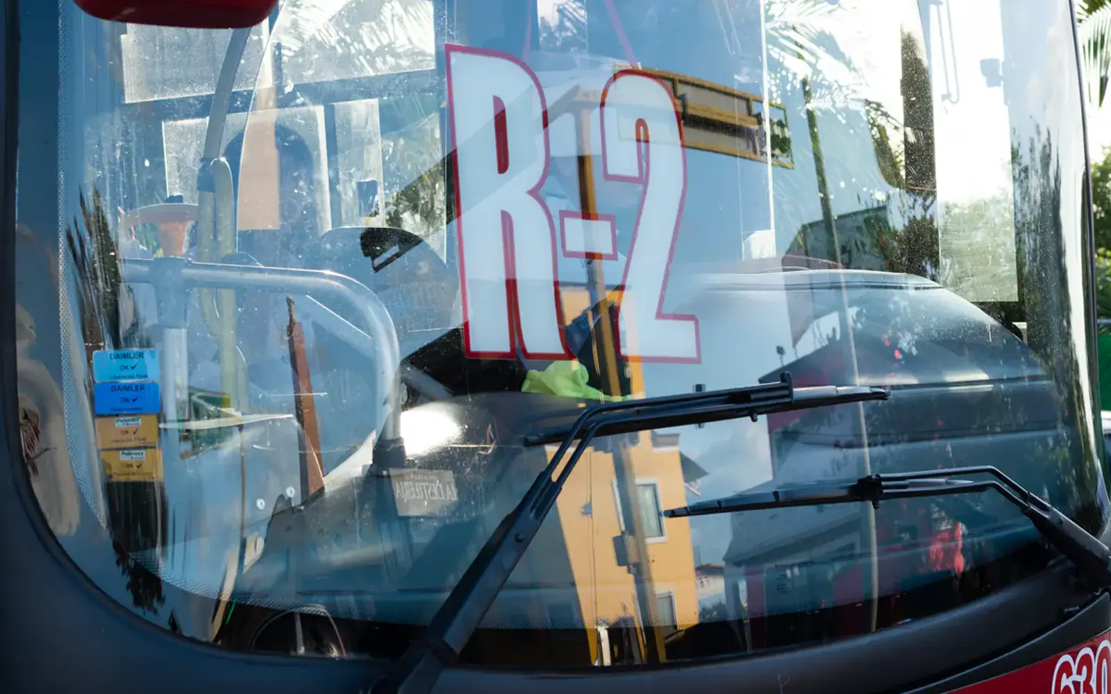 A red and white Cancun city bus
