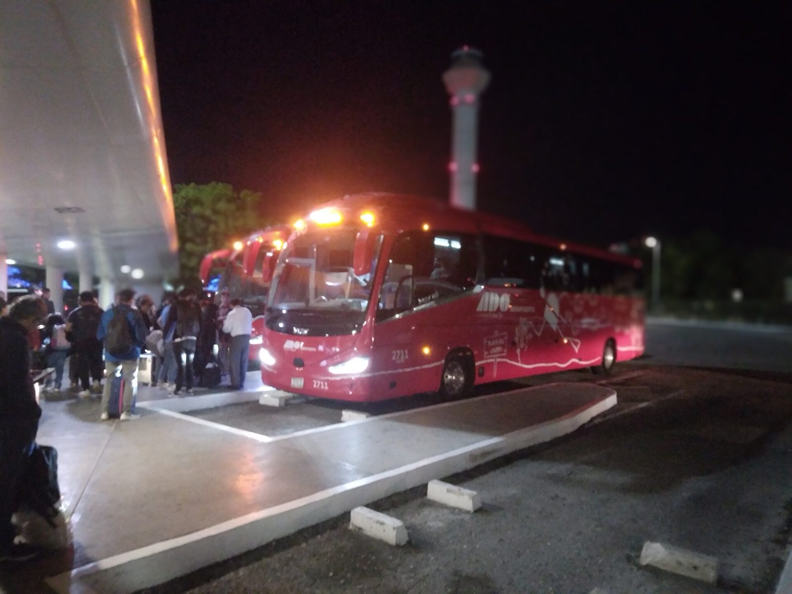 ADO bus platforms outside Terminal 2 at Cancun International Airport