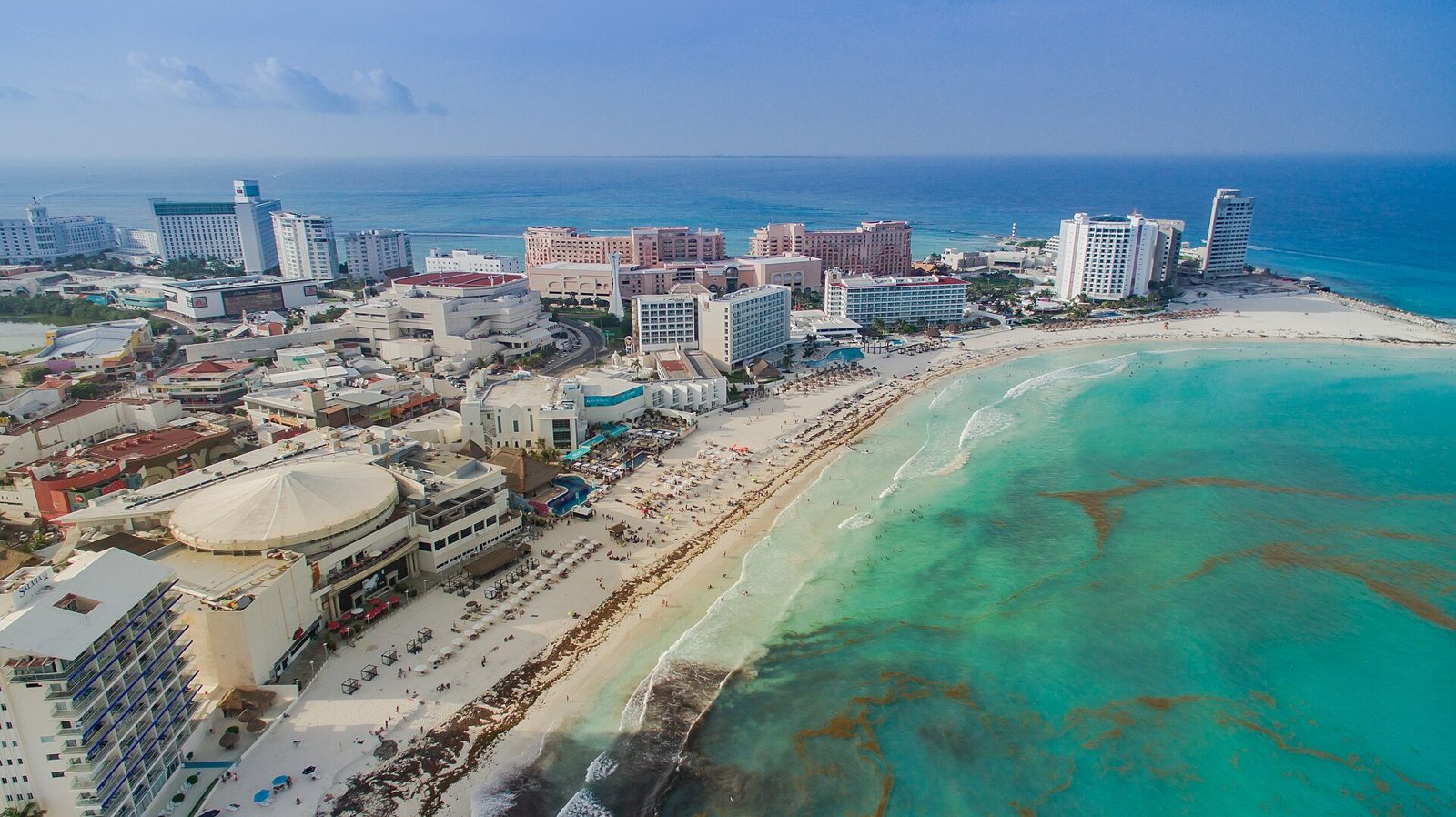 An aerial view of Cancun's Hotel Zone between the sea and the lagoon