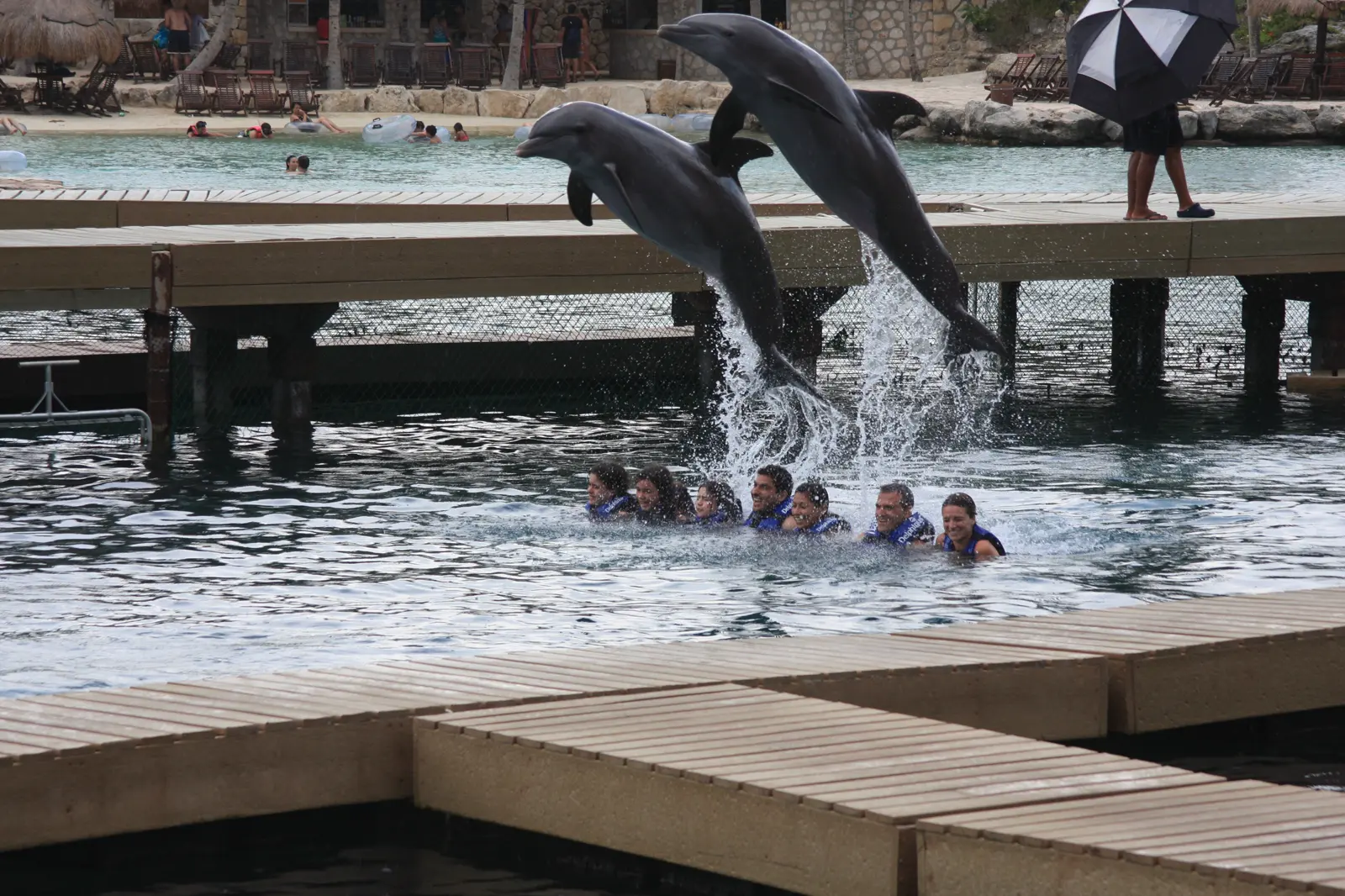 A thatched walkway over the water at Xcaret